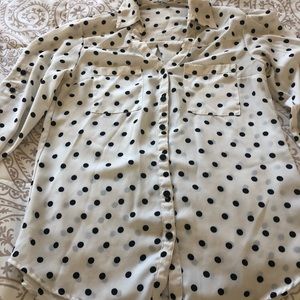 Long polka dot shirt with long sleeves. Missing one button on sleeve.
